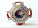 Top view of a Damcos BRC 052-A1 hydraulic actuator showing the multi-bolt casing and brass center position indicator.