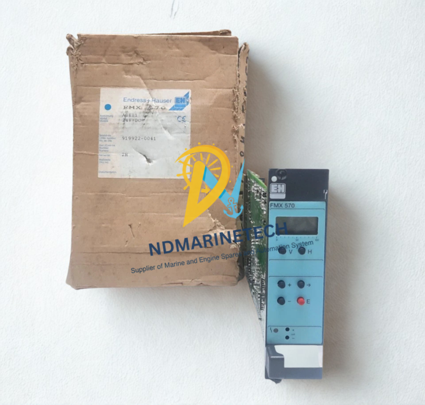Surplus Endress+Hauser FMX 570 Level Transmitter in Original Box New old stock Endress and Hauser FMX 570 level transmitter card resting alongside its original factory cardboard packaging box showing product model stickers.