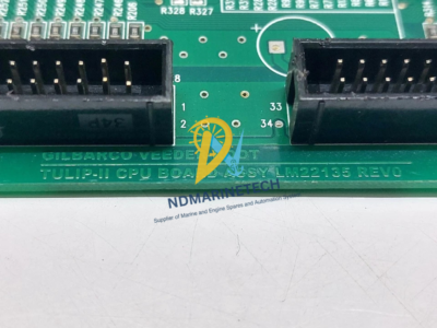 Gilbarco LM22135 Tulip-II CPU Board Hardware Revision 0 Details Close-up of Gilbarco Veeder-Root Tulip-II CPU Board Assy LM22135 Rev 0 text engraving on green PCB with black pin headers.