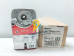 Honeywell S05010 MS7505B2030 5 Nm spring return direct coupled actuator next to its original Honeywell manufacturer packaging box.