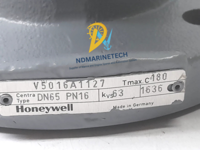 Honeywell V5016A1127 Nameplate and Technical Specifications Close-up of the metal nameplate on a Honeywell V5016A1127 valve, displaying technical specifications: Centra Type, DN65, PN16, Kvs 63, Tmax 180°C, and Made in Germany.