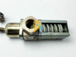 Close up of Johnson Penn Controls V46BD-9510 water regulating valve showing the heavy-duty internal range adjustment spring and threaded port.
