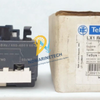 Telemecanique LX1FG380 replacement coil for TeSys F contactor standing next to its original Schneider Electric factory packaging box with barcode label.