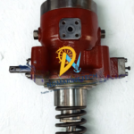 MAN B&W 58/64 fuel injection pump assembly showing the high-pressure block casing, fuel flange connection, and heavy-duty plunger return spring mechanism.