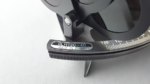 Macro close-up of the engraved model number GLH130-40 and serial number on the graduated arc of the marine sextant.