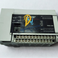 Top-down angle view of Mitsubishi FX5U-32MT/ESS base unit displaying CC-Link IE Field Basic and communication ports interface.
