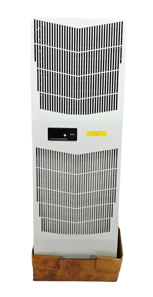 NVENT HOFFMAN G521246G050 New Front face overview of the white nVent HOFFMAN G521246G050 SpectraCool enclosure air conditioner featuring the upper and lower ventilation air intake grilles.