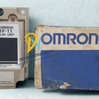 OMRON 61F-G floatless level switch and 61F-11 relay unit standing next to its original blue and white OMRON factory packaging box.