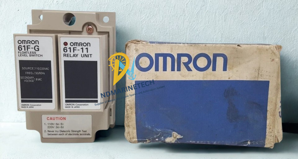 OMRON 61F-G Floatless Level Switch OMRON 61F-G floatless level switch and 61F-11 relay unit standing next to its original blue and white OMRON factory packaging box.