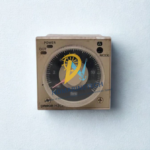 Front dial interface of OMRON H3CR-A timer with adjustable time scale, mode indicators, and power LED.