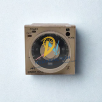 Front dial interface of OMRON H3CR-A timer with adjustable time scale, mode indicators, and power LED.
