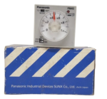 Panasonic PM4S-A2C10M-AC120V industrial time delay relay positioned on top of its original blue and white Panasonic Industrial Devices box packaging.