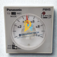 Close-up front view of Panasonic PM4S-A2C10M-AC120V multi-range timer showing the analog dial setting, time ranges, and mode selector switch.