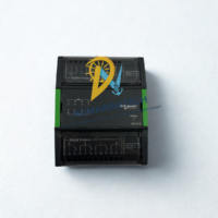 Front view of New Schneider Electric DO-FC-8 SXWDOC8XX10001 SmartX I/O central module featuring LED status indicators and 8 digital outputs.