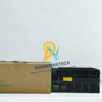 Schneider Electric TM241CE40T Modicon M241 programmable logic controller displayed next to its original factory packaging box on a clean workspace.