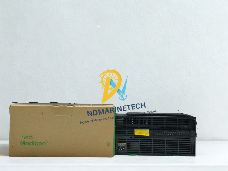 Schneider TM241CE40T Logic Controller Schneider Electric TM241CE40T Modicon M241 programmable logic controller displayed next to its original factory packaging box on a clean workspace.