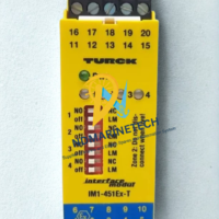 Front view of a yellow Turck IM1-451EX-T isolating switching amplifier showing channel LED indicators and configuration DIP switches.