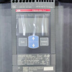 Close-up of ABB PSE300-600-70-1 display interface panel showing terminal ratings and technical certification laser print