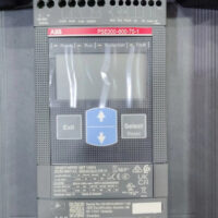 Close-up of ABB PSE300-600-70-1 display interface panel showing terminal ratings and technical certification laser print