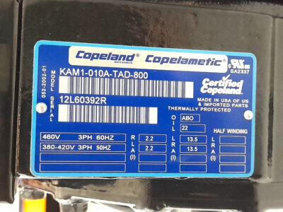 Technical Specification Nameplate data for Copeland KAM1-010A-TAD-800 Close-up of blue metal specification nameplate for Copeland Copelametic KAM1-010A-TAD-800 compressor detailing 460V 60Hz and 380-420V 50Hz 3PH ratings, RLA 2.2, LRA 13.5, and Serial Number 12L60392R.