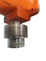 Close-up of Crowcon 96HD Ex d IIC T6 flammable gas detector stainless steel sensor head housing showing part number S01749/A calibration sticker.
