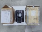 Complete genuine supply package of a Daihatsu 6DL-20 engine piston alongside its export wooden shipping box, inner packing carton, and technical inspection release certificate.