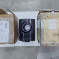 Complete genuine supply package of a Daihatsu 6DL-20 engine piston alongside its export wooden shipping box, inner packing carton, and technical inspection release certificate.