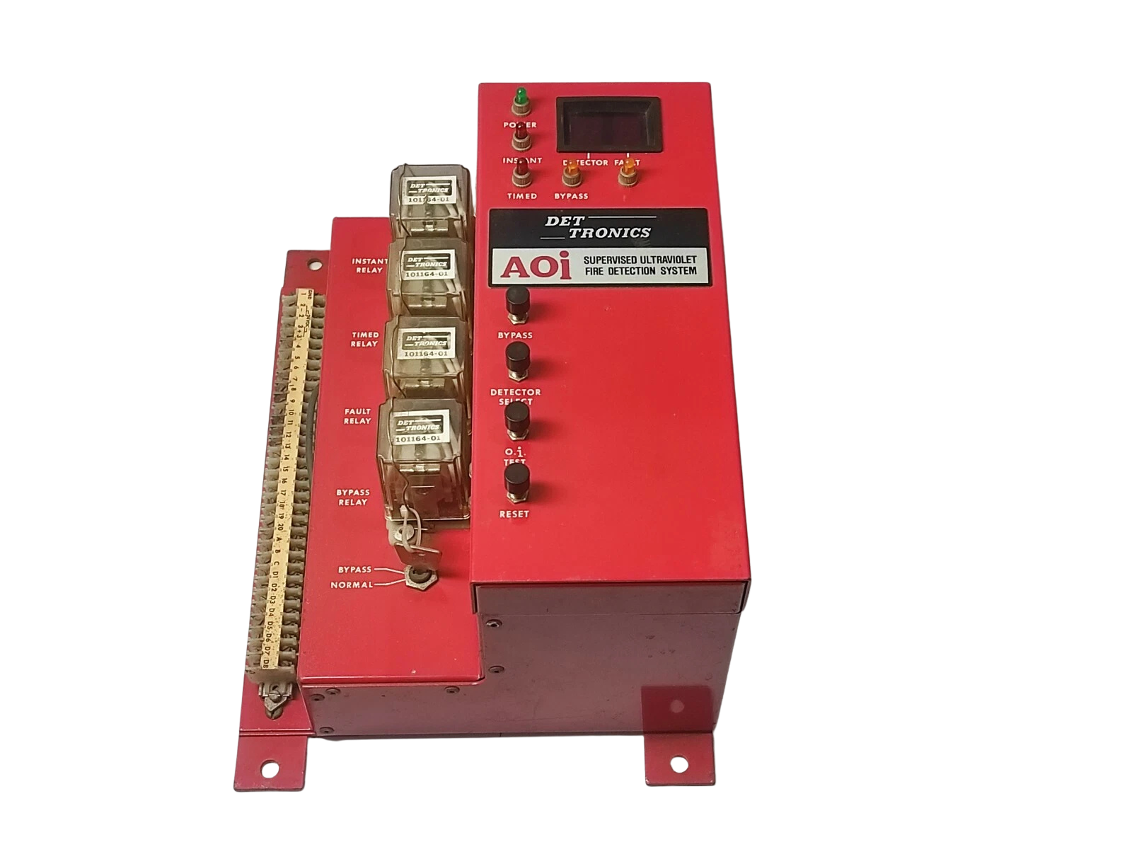 Det-Tronics 001863-02 Rev A Side profile view of Det-Tronics AOi Supervised Ultraviolet Fire Detection System controller housing showing push buttons and status indicator LEDs.