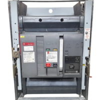 Front facade view of a draw-out style GE Power Break II SHD25B220 circuit breaker featuring the mechanical charging handle, push ON/OFF buttons, digital trip unit, and side racking guide rails.