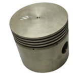 External view of the Gardner Denver 5WAG15 compressor piston showing ring grooves and top surface