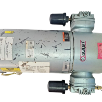 Full top-down layout view of the Gast 5HCD-10-M533 twin-cylinder oil-less piston air compressor highlighting symmetrical pump heads and full motor chassis.