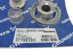 Close-up of Grundfos 97788185 shaft seal kit label indicating model DQQV, MFG greater than 0404, made in Denmark with barcode detail.