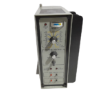 Front faceplate featuring test selector knob, manual voltage dial, and diagnostic indicators of GCI 7359-2400-424
