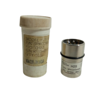 Honeywell Analytics SPXCDXSHXSS H2S sensor next to its original protective storage container
