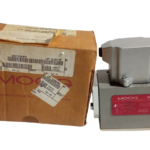 MOOG D631K 294FK servo control valve next to its original manufacturer box packaging