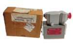 MOOG D631K 294FK servo control valve next to its original manufacturer box packaging