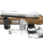 Complete National Oilwell Varco SPK-51037879-3 spares kit featuring a precision-machined adjustable stem with tungsten carbide tip, matching valve seat sleeve, aluminum position indicator scale, and associated API 6A seal kits displayed with the factory shipping box.