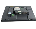 Rear view of Schneider HMIDT732 Magelis GTU 15-inch smart display showing the attached CPU box module, communication ports, and power terminals.