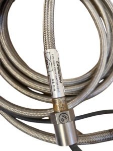UNISON 9059355-204 Explosion Proof Ignition Lead Label UNISON Industries 9059355-204 explosion proof ignition lead label showing GE P/N and FM certification stamp on stainless steel braided cable.