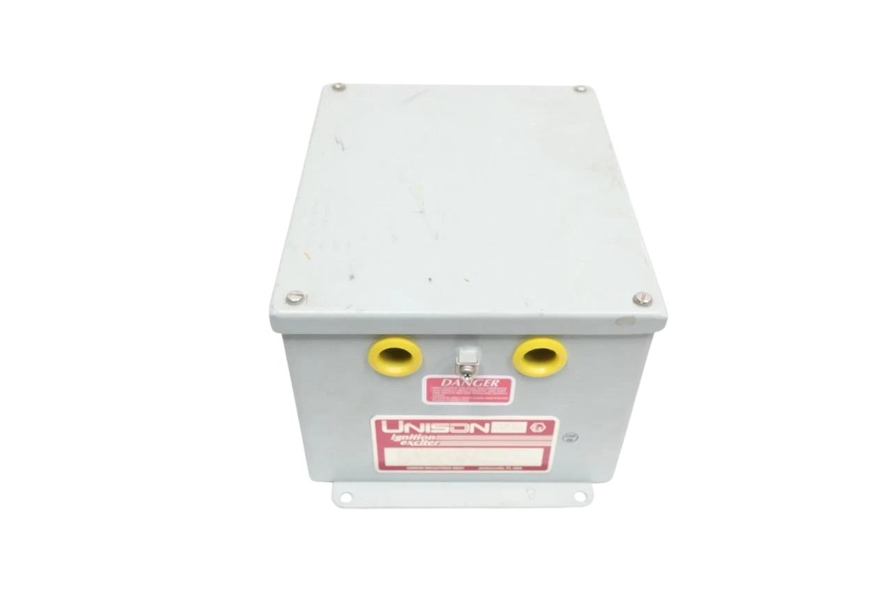 Unison 9060040-1G Ignition Exciter Unison 9060040-1G Ignition Exciter 100VA 230VAC heavy duty industrial gas turbine ignition generator enclosure with dual terminal ports and red manufacturer labels
