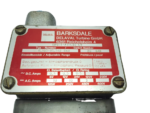 Close-up of Barksdale DPD1T-A150SS-LV nameplate showing electrical ratings and pressure range