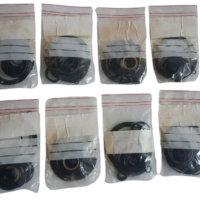 Multiple sealed packets of OEM Damcos A/S 219-0200 seal sets for marine valve actuators.
