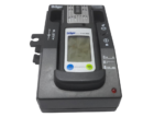 Top-down view of Dräger X-am 5000 gas detector securely seated in 8318639 Lademodul desk charger