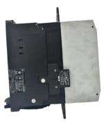 Left side view of Eaton XTCE580N contactor showing technical rating nameplate, agency approvals, and auxiliary switch
