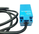 Close-up of Honeywell FL2R-12J6H proximity switch housing, cable entry, and mounting holes