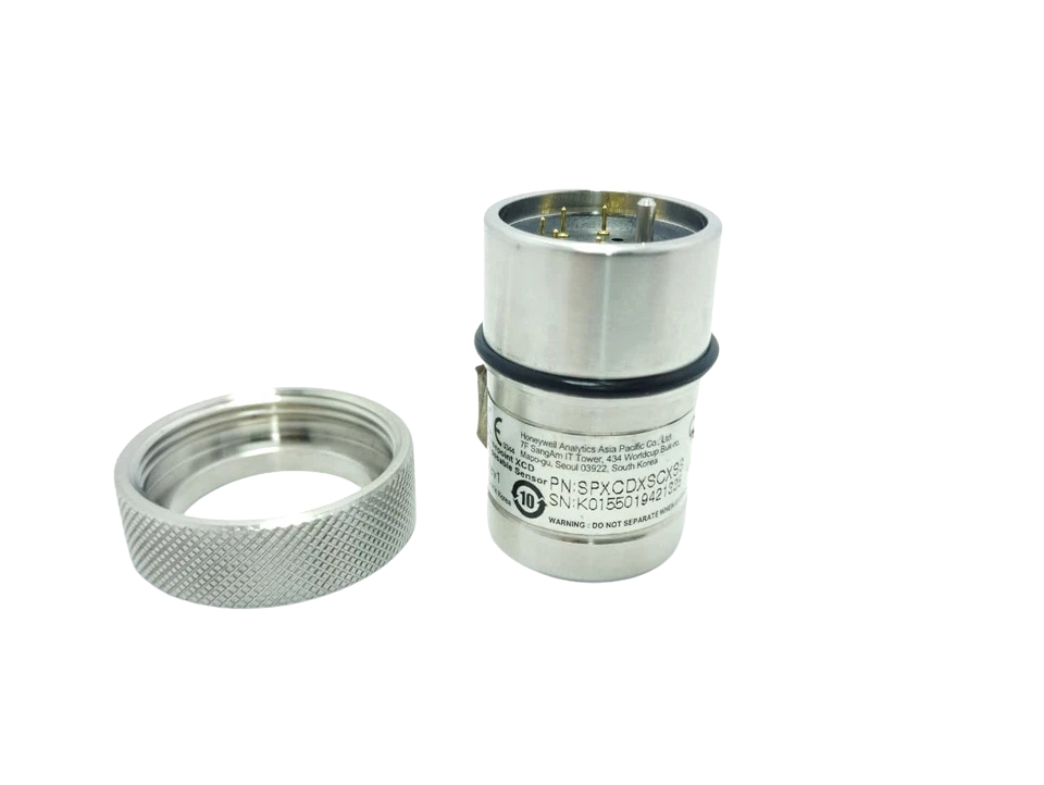 Honeywell SPXCDXSCXSS Carbon Monoxide Sensor Honeywell Sensepoint XCD SPXCDXSCXSS CO sensor cell showing top contacts and lock ring