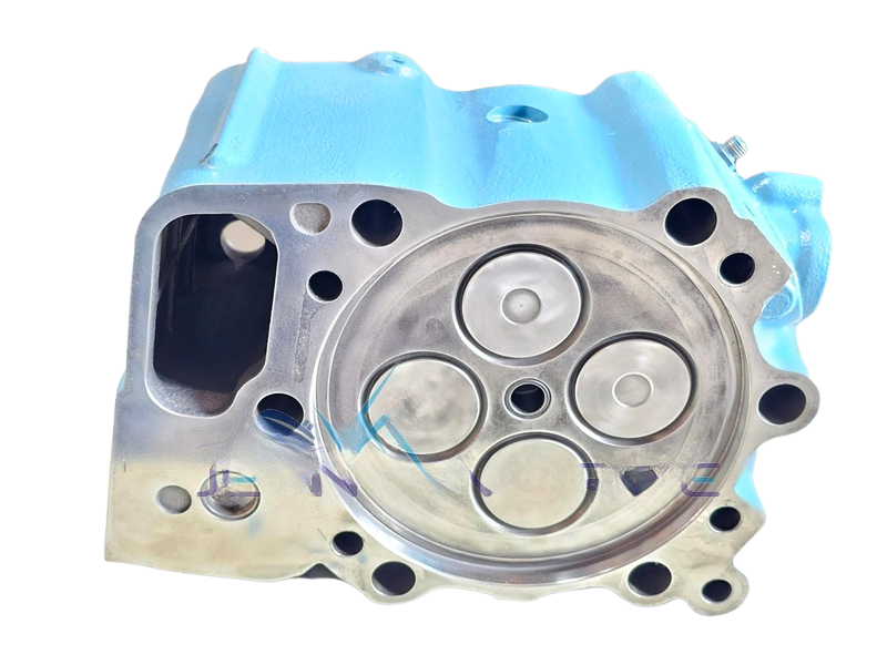 MTU 4000 cylinder head1 Combustion face of an MTU 4000 cylinder head, showing four valves and the fire deck surface.