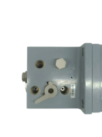 Close-up of signal port, adjustment selector switch, and pneumatic connection interfaces on Masoneilan 4611 positioner.
