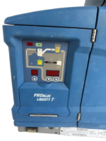 Side view of Nordson Problue L7 adhesive melter showing warning labels and ports