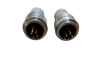 A high-angle view of two Riken Keiki industrial gas sensors, focusing on their multi-pin circular connectors and the etched "RIKEN KEIKI" and "HW-6211" text.